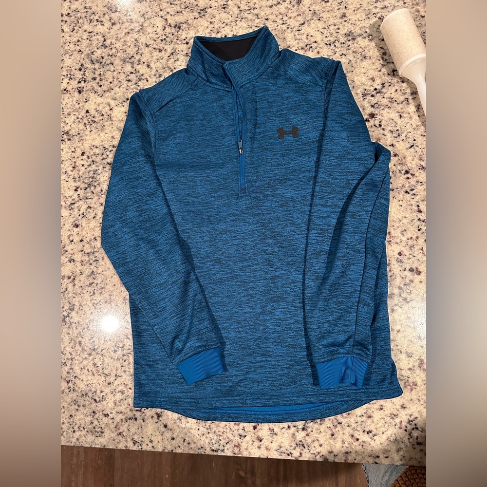 Men’s Under Armour cold gear. 1/4th zip. Nice thick material. Fleece lined